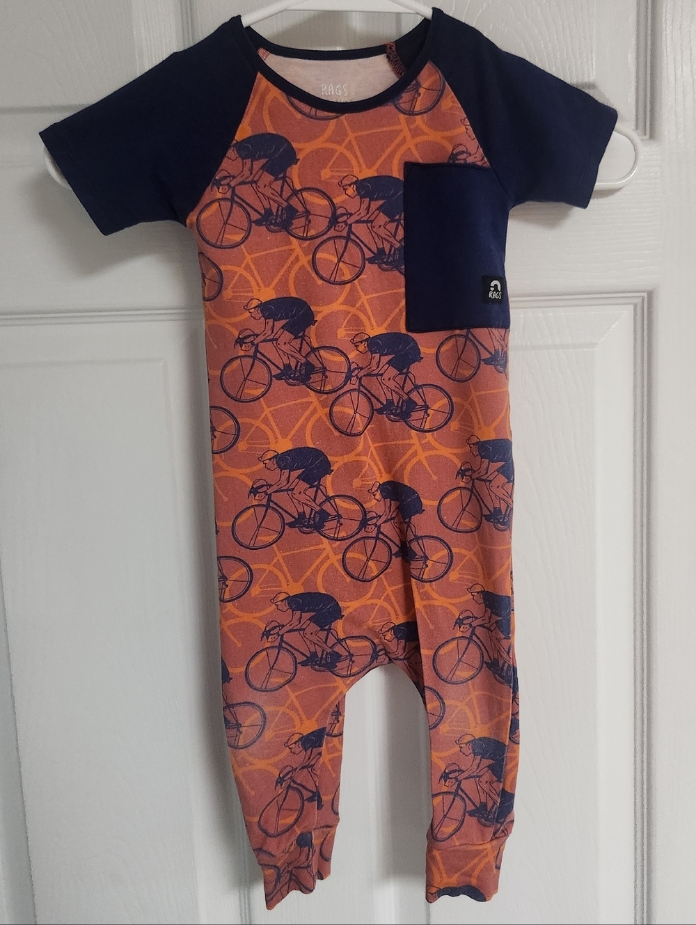 RAGS Orange Bicycle Print One-Piece Romper with Navy Accents